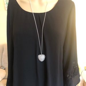 Black blouse with flouncy sleeves